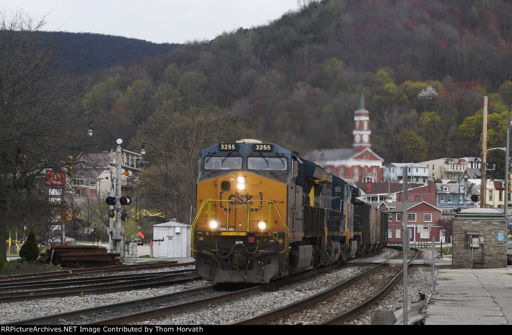 CSX 3255 leads a coal train on an overcast day